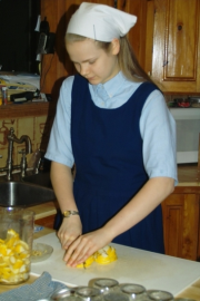 Evelyn cutting the fruit
