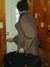 Suitcases, food, etc., is packed.